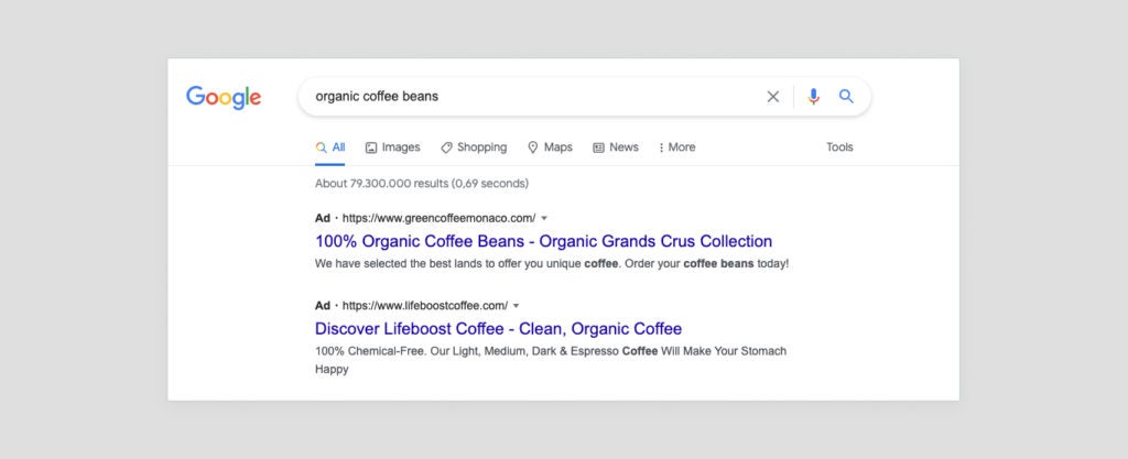 Google search ad results for "organic coffee beans". 