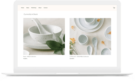 Online store built by artist selling pottery shown on a laptop.