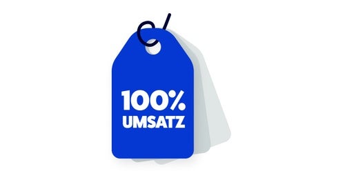 Ein blauer Kofferanhänger mit der Aufschrift “100 Prozent Umsatz”.