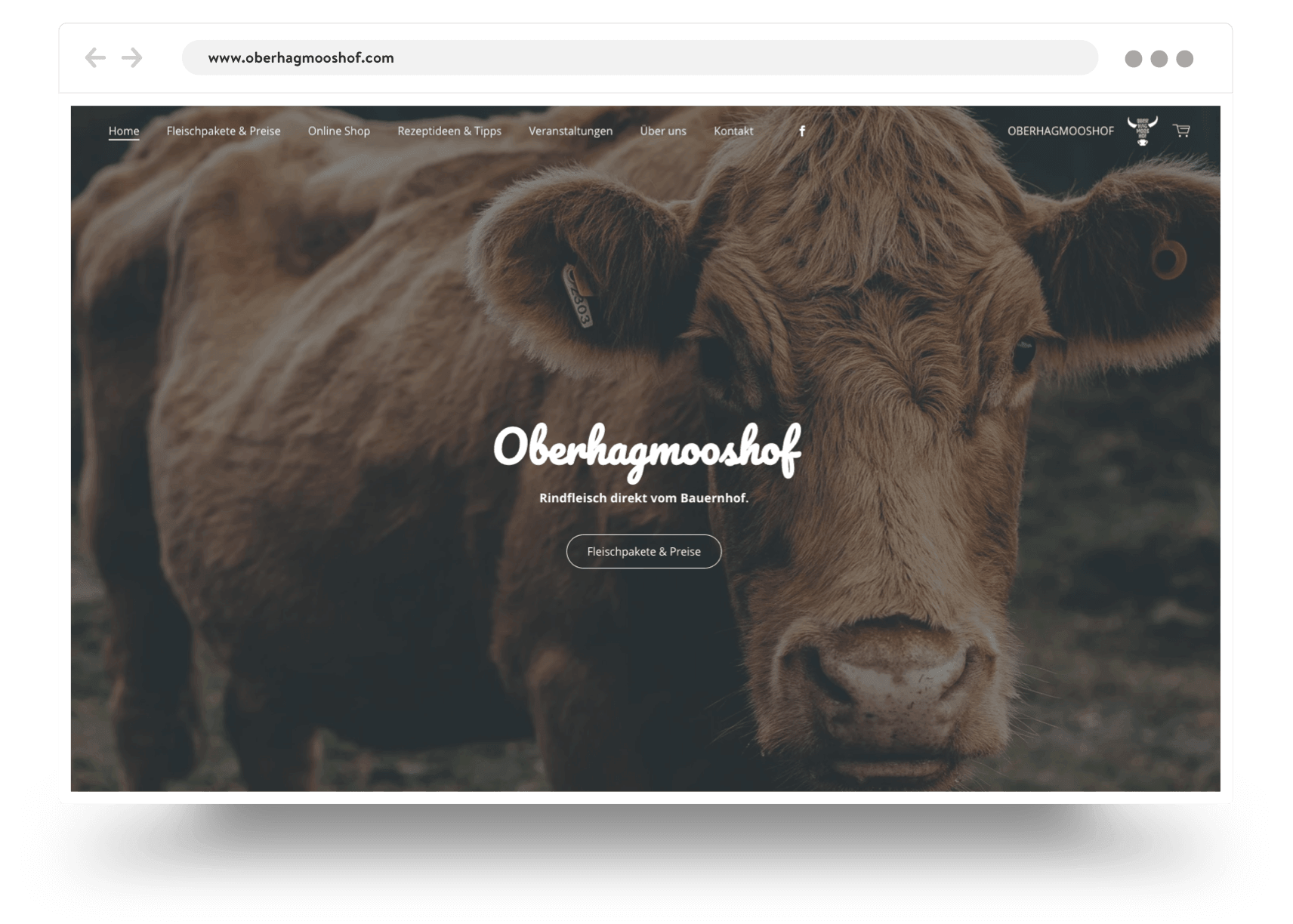 Página de inicio de la página web de una tienda de productos para granjas con un primer plano de la cara de una vaca 